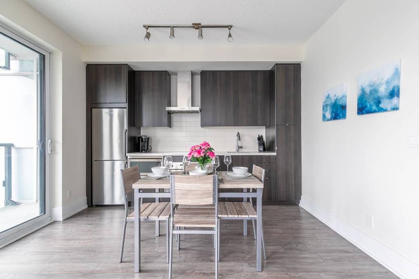 The kitchen table comfortably seats four guests.